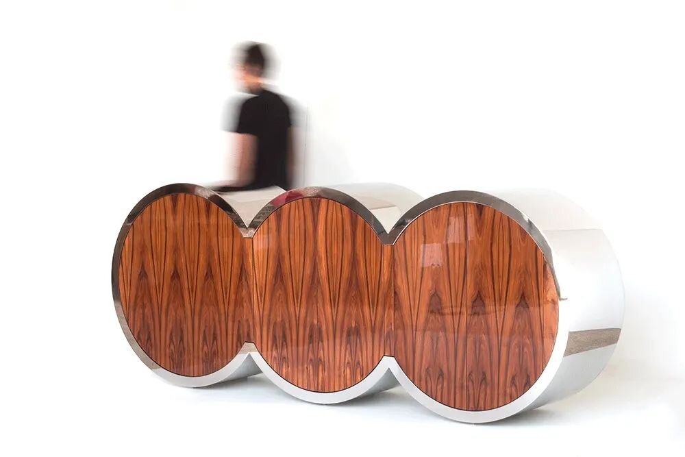 BACCHUS sideboard

Limited Edition collection

BACCHUS, the Roman God of wine, and the wooden barrels holding this delicious beverage, provide the inspiration for NAUU&nbsp;to create this sideboard, limited to 20 numbered pieces. Its avant-garde desi